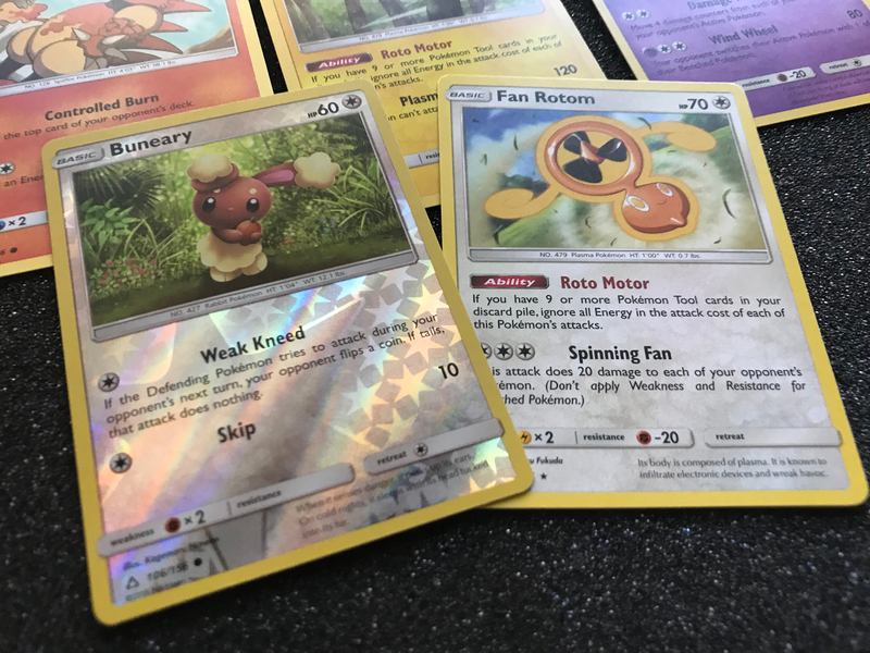 Illustration for article titled Let's Open Some Pokemon Ultra Prism Cards And See If There's Anything Good